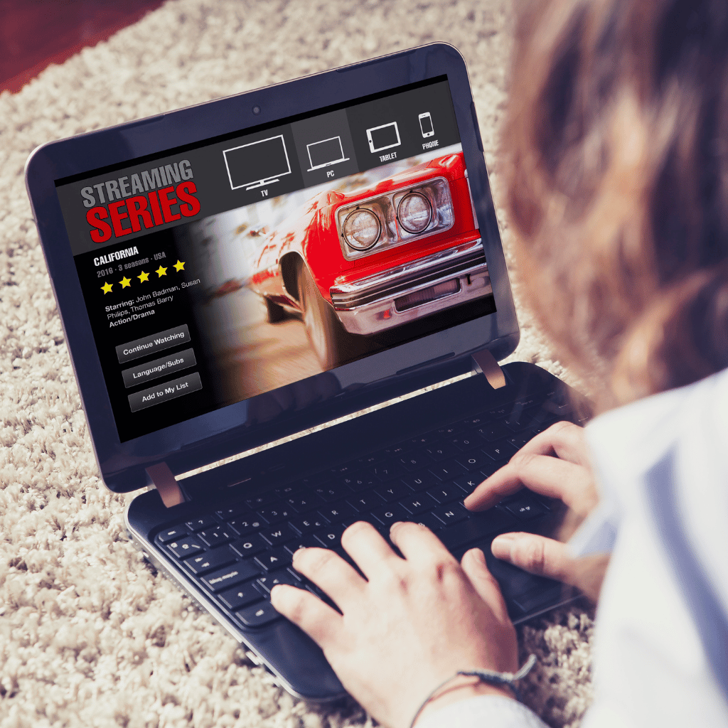 "a girl watching movie on the laptop"